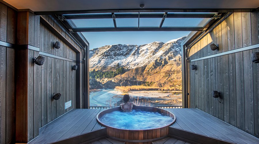 Luxury hot tub overlooking mountains in New Zealand